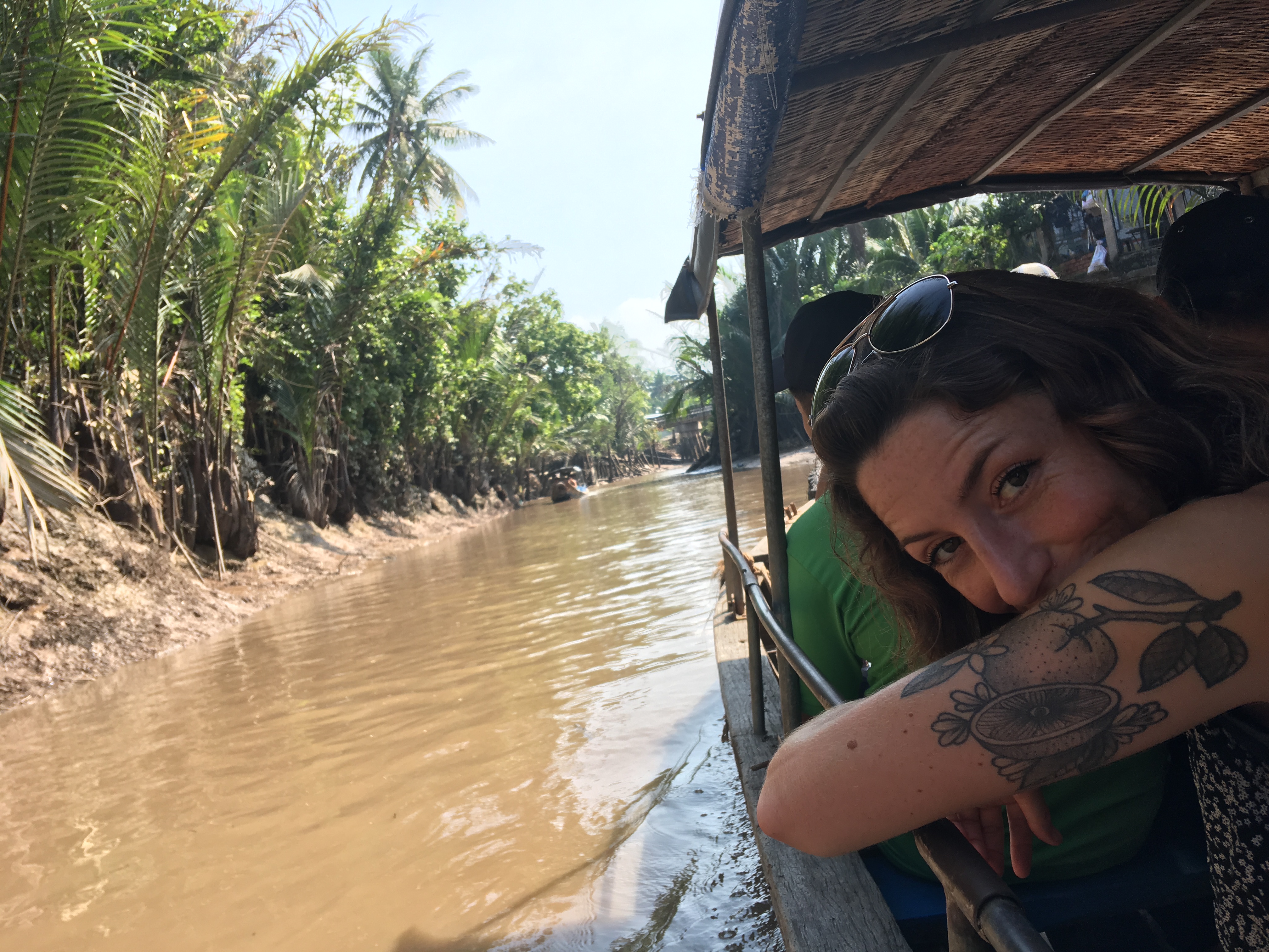 Rosalie traveling on a barge on the Makong Delta