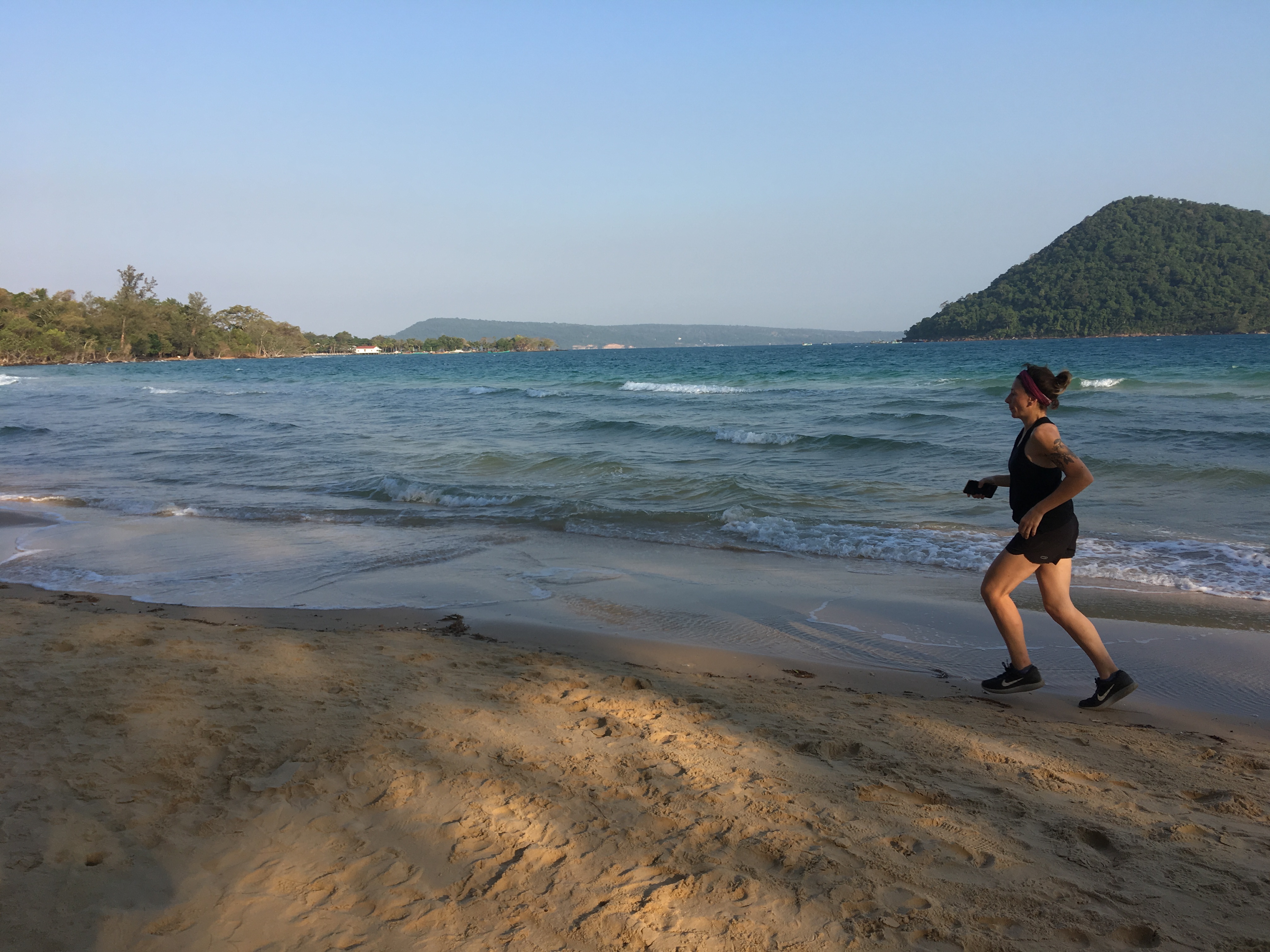 Rosalie running along the beach on Koh Rong Samloem